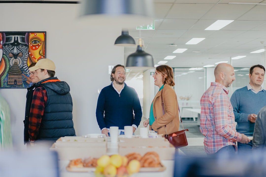 Employees participating in a workplace wellness event inside a modern office