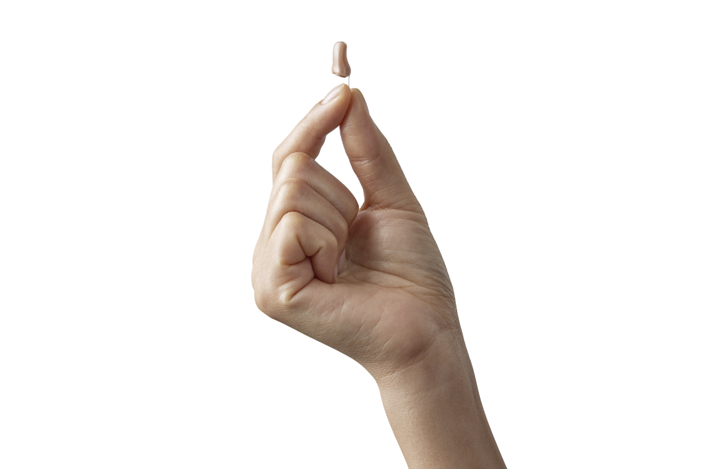 Beige Oticon Jet PX invisible-in-canal hearing aid