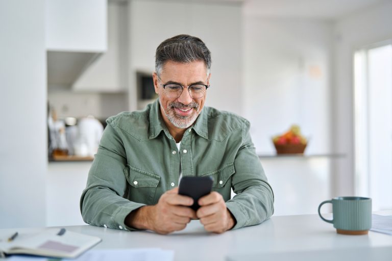 Adult using a smartphone in an everyday listening situation